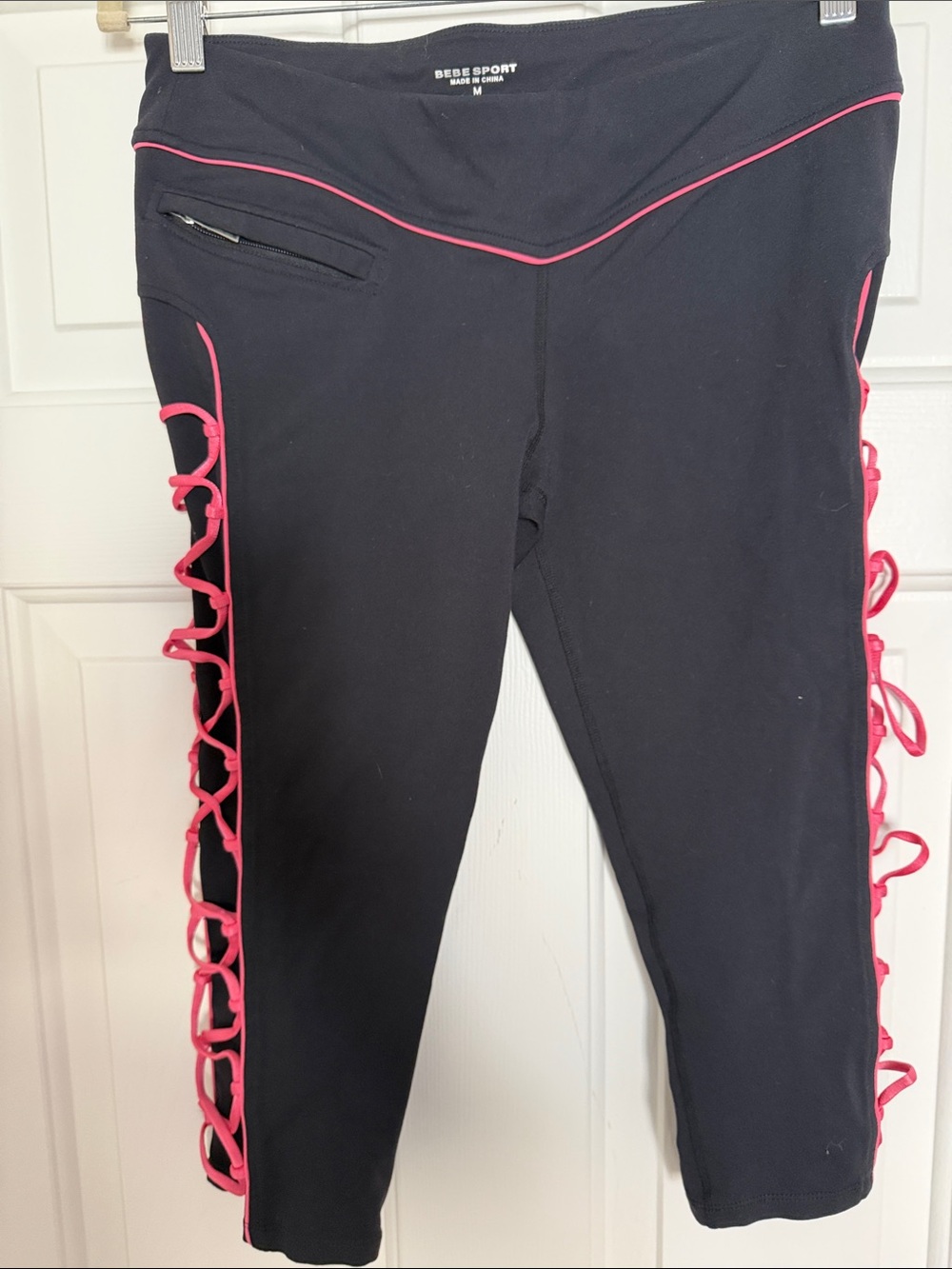 bebe Black Capri Leggings with Pink Lace-Up Sides, perfect, size M, waist- 30”